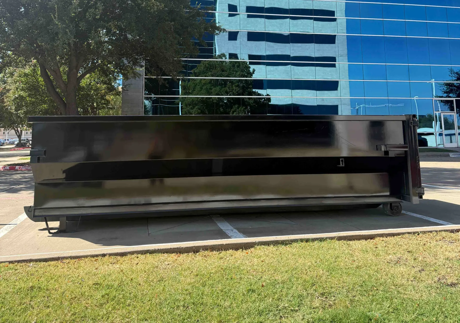 Nortex roll-off dumpster at a commercial property